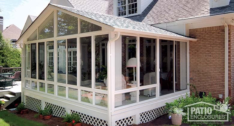 How do you enclose a patio cheaply?